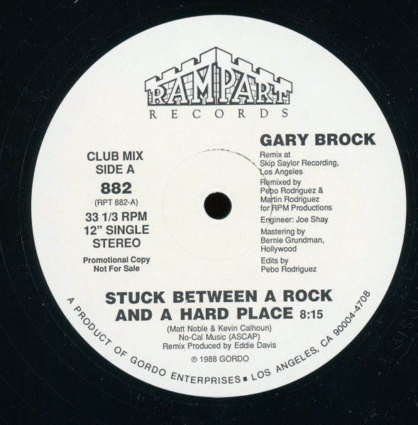 Stuck Between A Rock And A Hard Place